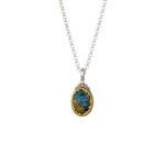 Dione oval pendant in sterling silver with Gold plated parts
