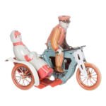 Κουρδιστή Μεταλλική Μοτοσυκλέτα Με Κυρία Στο Πλαϊνό Κάθισμα